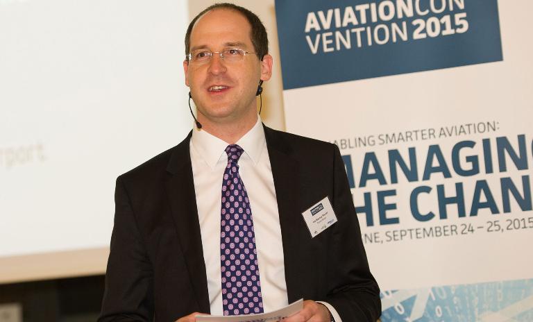 Roland Berger's Kai-Marcus Peschl speaking at the Aviation Convention in Cologne.
