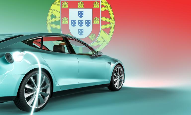 image of an electric car against the background of the portuguese flag