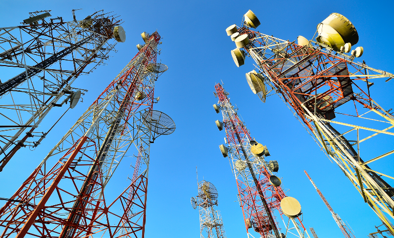 Telecom cell tower with blue sky