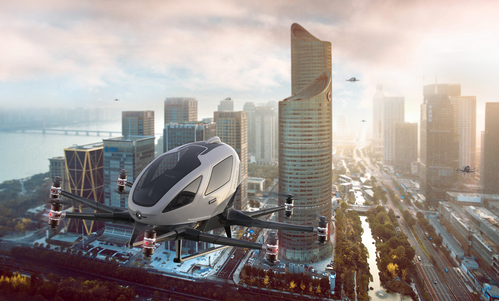An aerospace vehicle flies over a city.