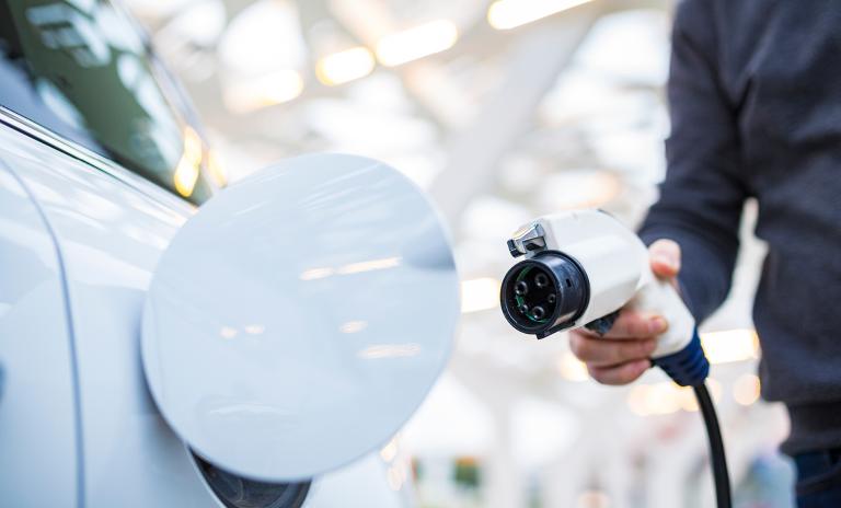 electric vehicle at a charging station
