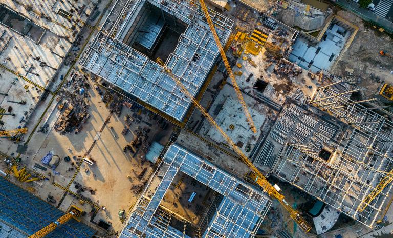High inflation makes new building projects unaffordable and so limits investment appetite.