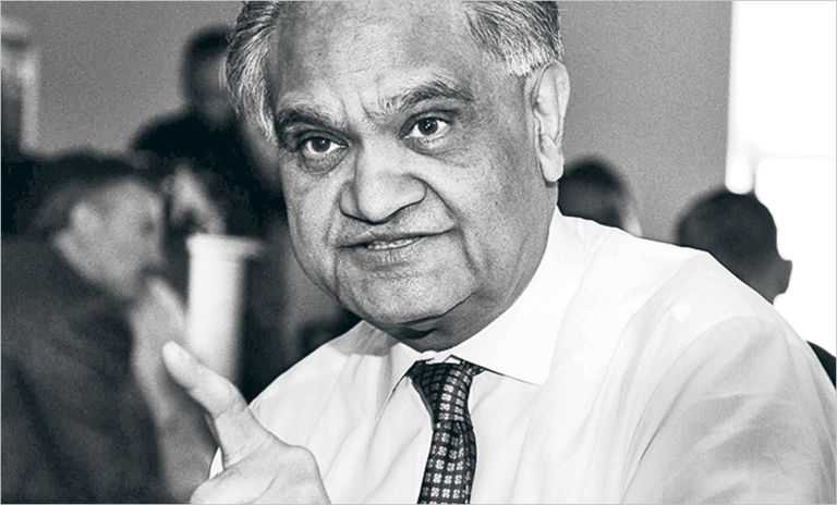 A headshot inblack and white of Ram Charan, CEO coach, director of seven boards and bestselling author.