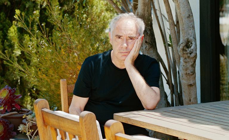 A photograph of celebrity chef Ferran Adrià at the site of his former Michelin-starred restaurant El Bulli from a distance.