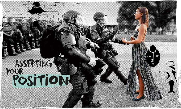 Ieshia Evans being arrested by police in riot gear during a Black Lives Matter protest in Baton Rouge
