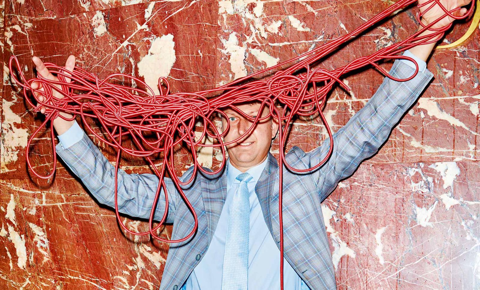His work focuses on computational social sciences - symbolically represented by cables.