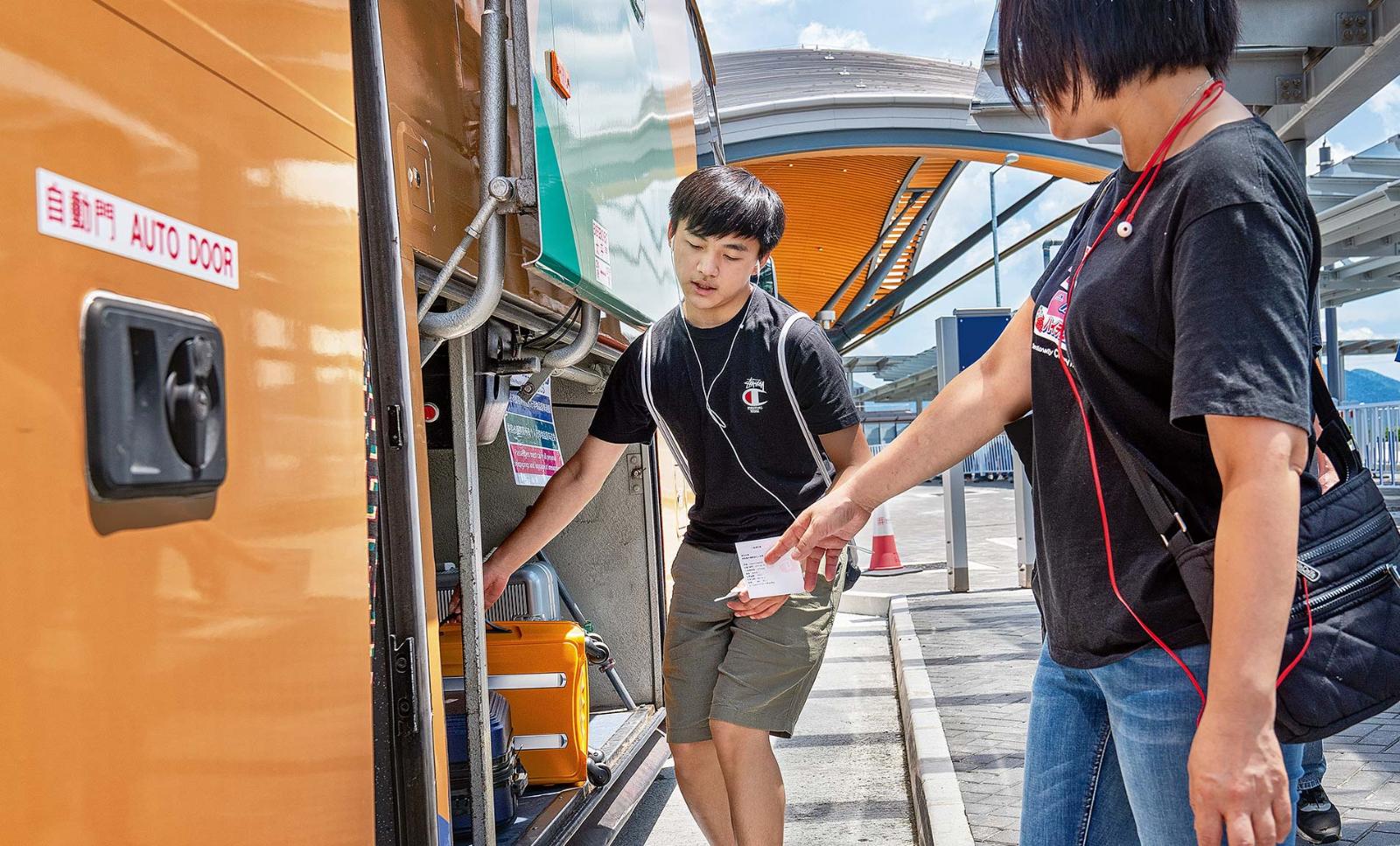 Mass transit over the water: Passengers crossing the Hong Kong-Zhuhai-Macao Bridge board a bus for a journey of about 30 minutes.