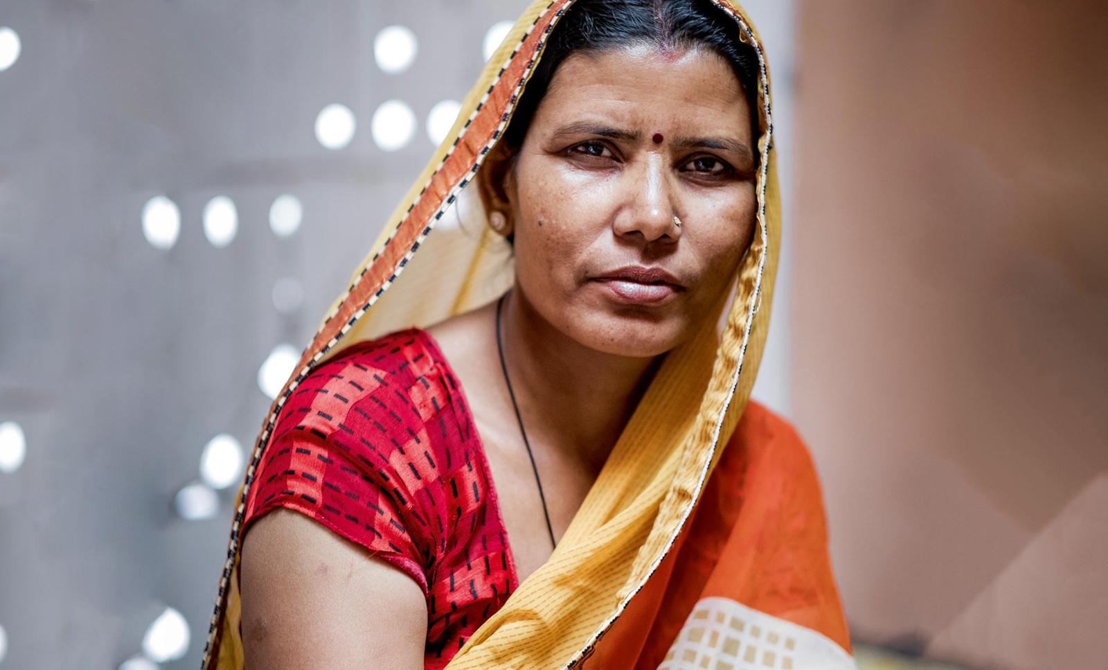 A common thread: Once struggling herself, Shanti (left) now oversees more than six looms and the 25 weavers that she can employ at a fair wage thanks to Jaipur Rugs' practices.