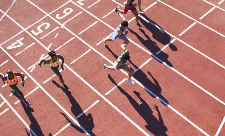 High angle view of a people running in a sports track.