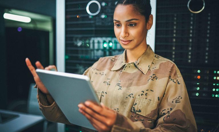 woman holding a tablet