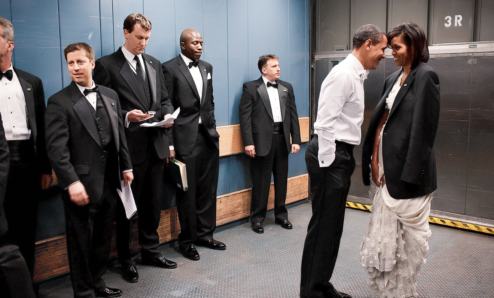 Barack and Michelle Obama in a freight elevator smiling at each other at his 2009 Inaugural Ball. (c) Getty Images