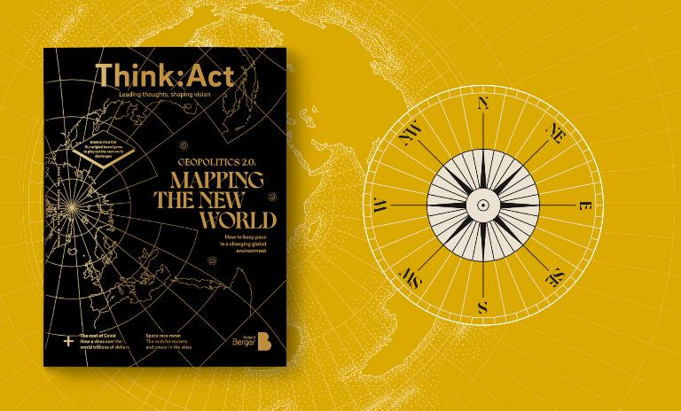 A black world map composed of golden latitudes and longitudes.