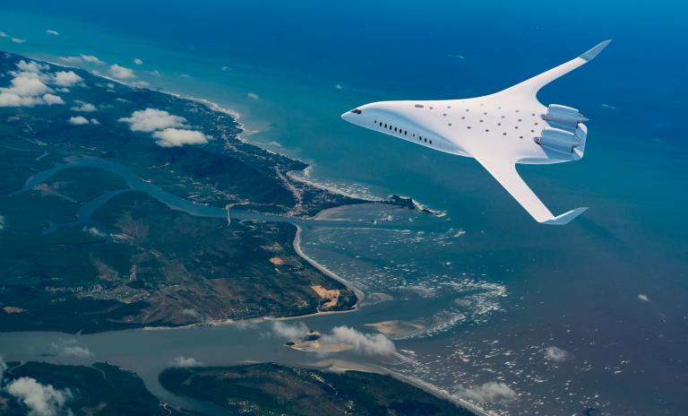 Image of a JetZero blended wing body aircraft flying over a coastline.
