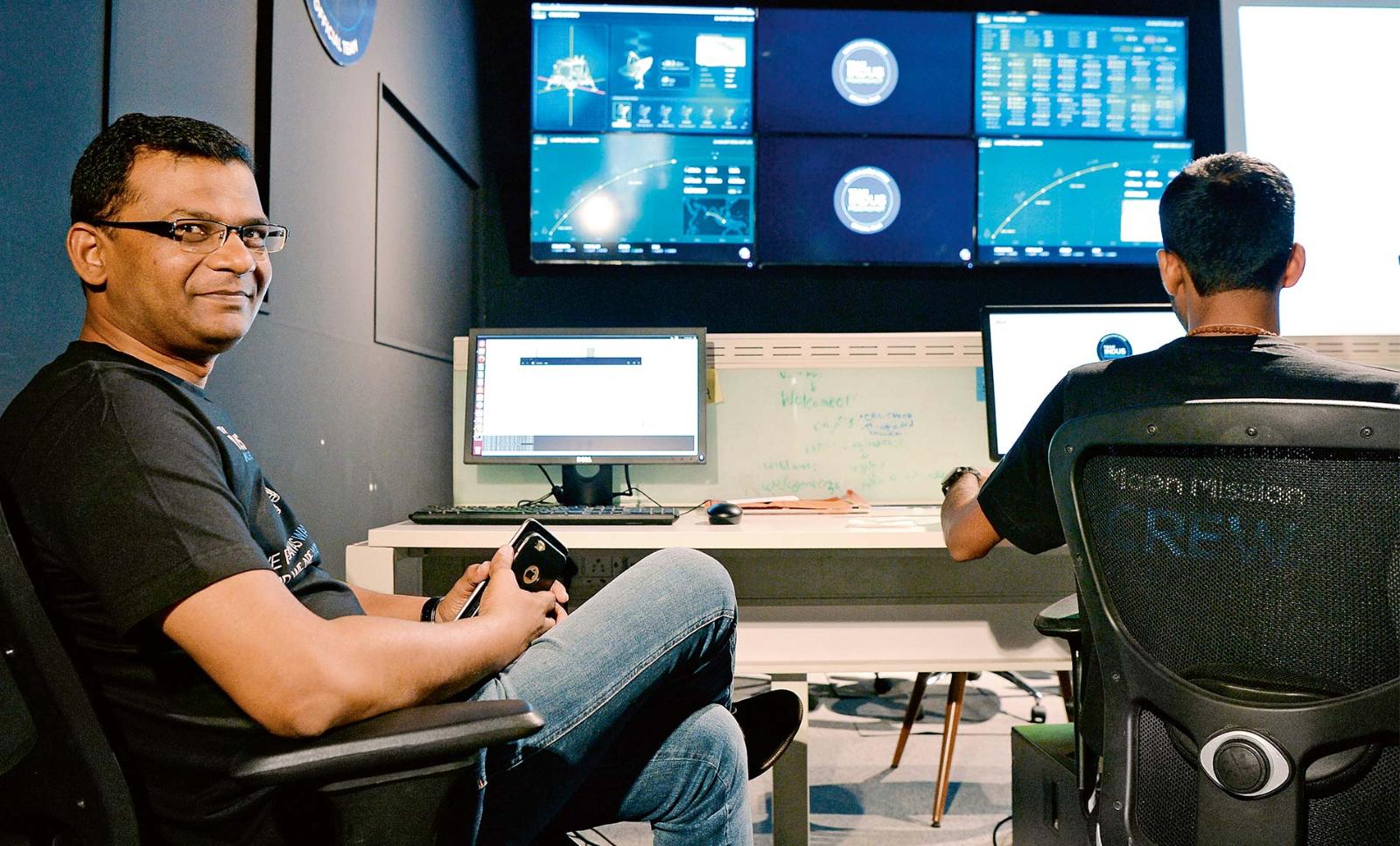 At the controls: Rahul Narayan holds a demonstration for the media at the TeamIndus lunar mission command center in October 2017.