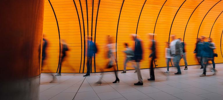 People in motion in the underpass