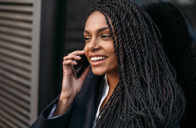 African business women with phone